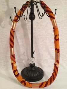 African Kente Print Orange and Copper Rope Necklace $60.99