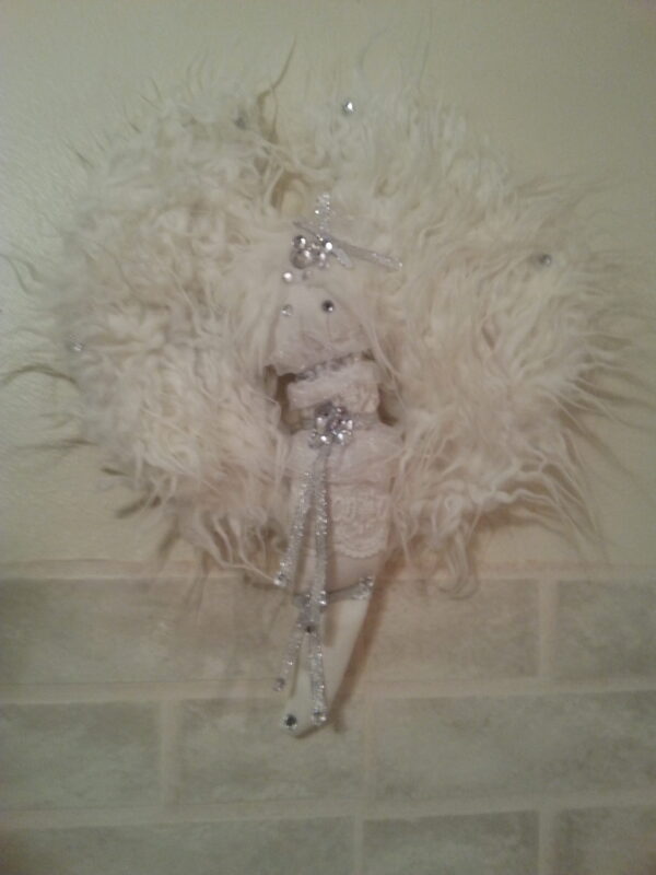 Front Side Of Angel Doll